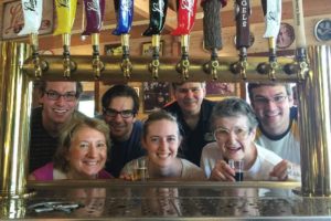 Family looking through bar